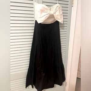 White and black strapless bow dress